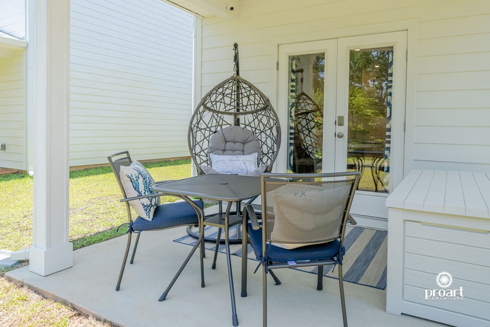 The peaceful backyard oasis, perfect for morning coffee or afternoon playtime.