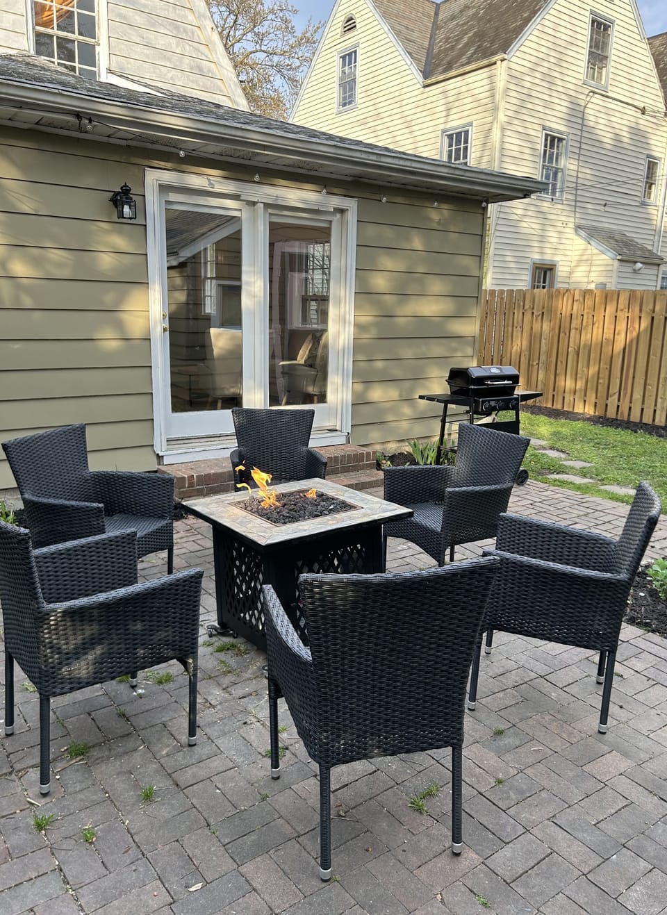 Patio with grill and fire pit.