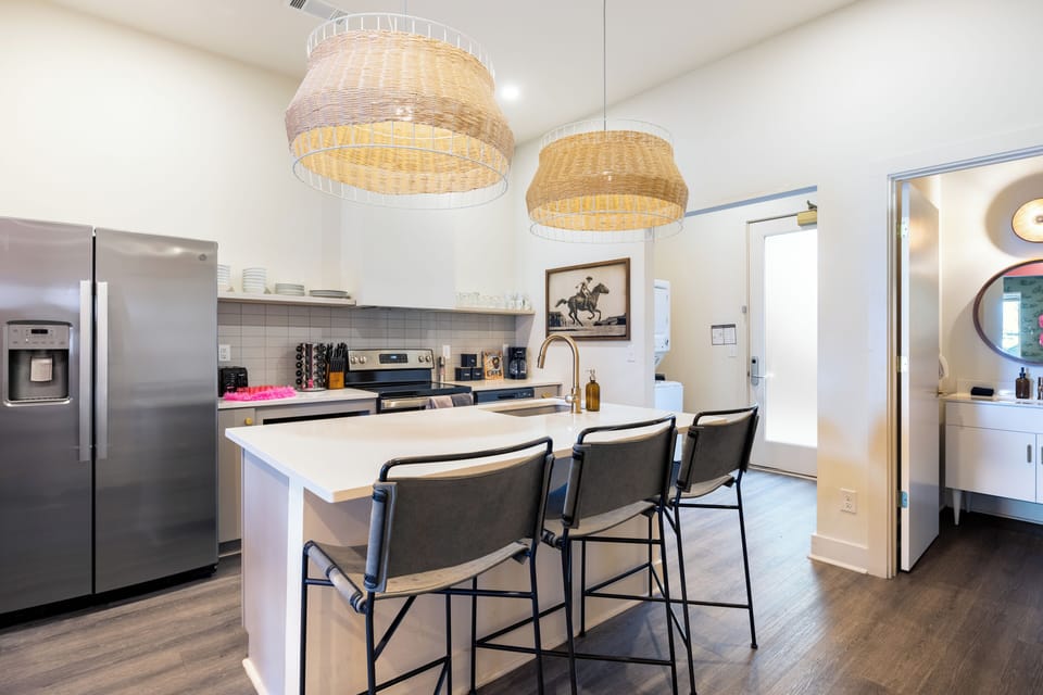 Fully equipped kitchen with a full suite of stainless steel appliances.