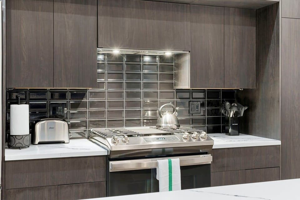 Stylish kitchen backsplash & organized prep space.