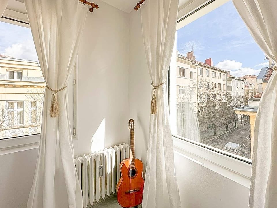 Feel the rhythm of Sofia from this bright corner with scenic views—where music and inspiration flow freely. Have a question or need tips for your stay? We're just a strum away—message us anytime!