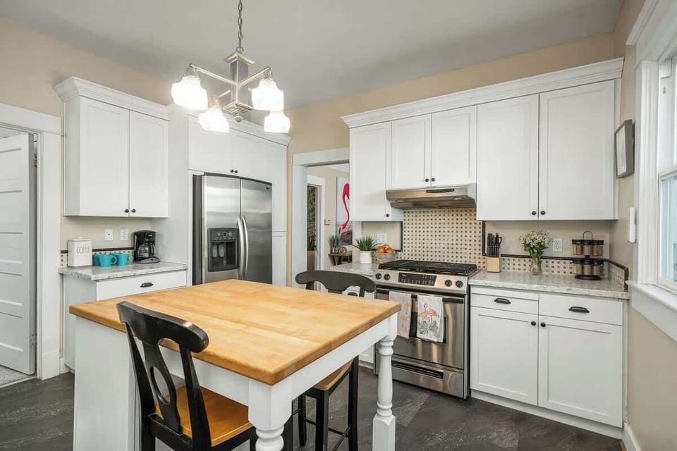 Kitchen with island and full-size appliances.