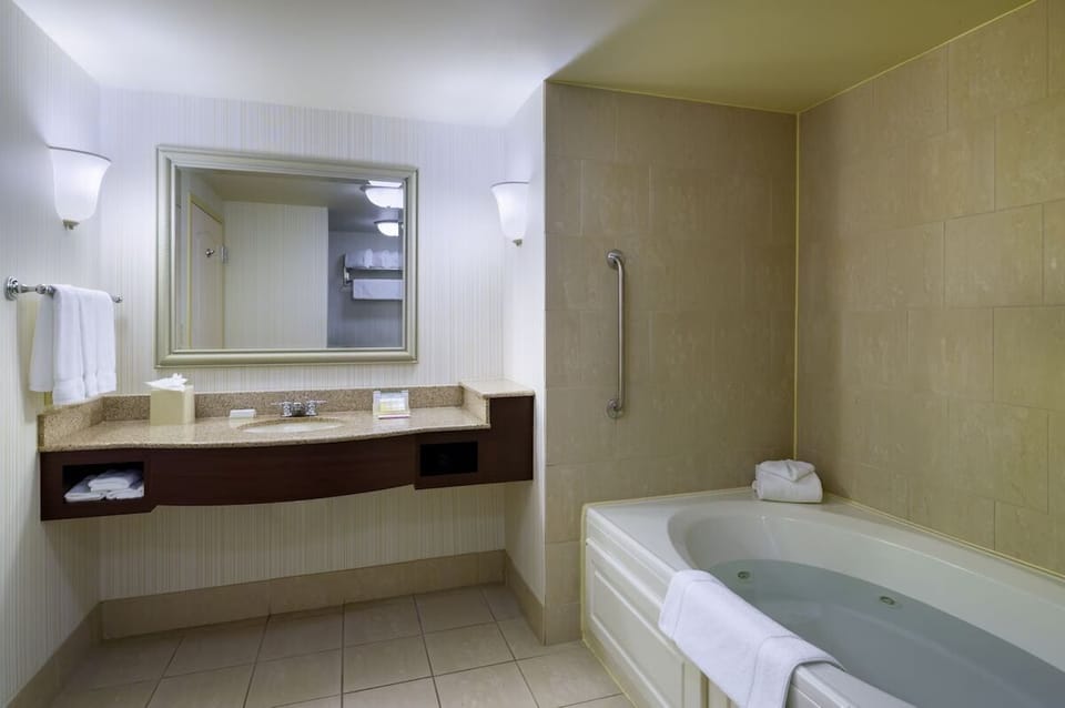 Soak and unwind in the deep tub after a long day.