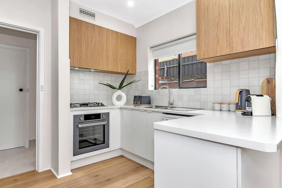 A newly renovated kitchen features everything that’s needed to cook meals, plus a dishwasher for easy clean-up.
