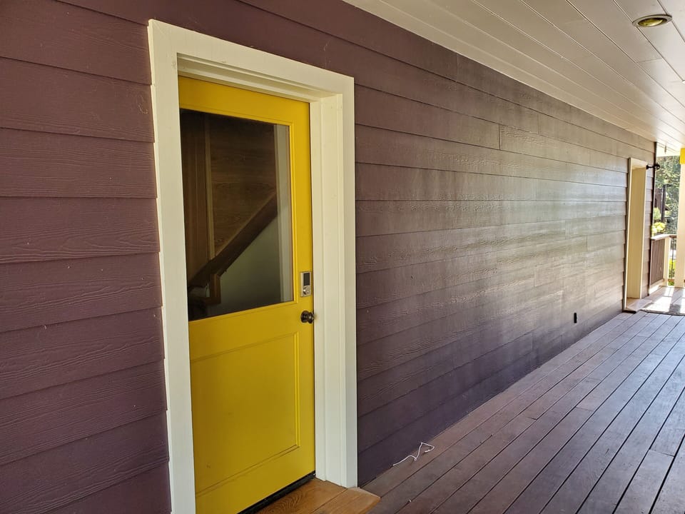 breezeway view of entry door to stairway
