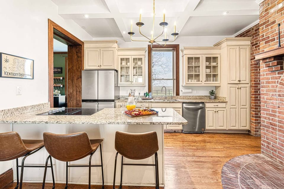 This 120-year-old home boasts modern amenities, including a kitchen equipped with all-new stainless steel appliances.
