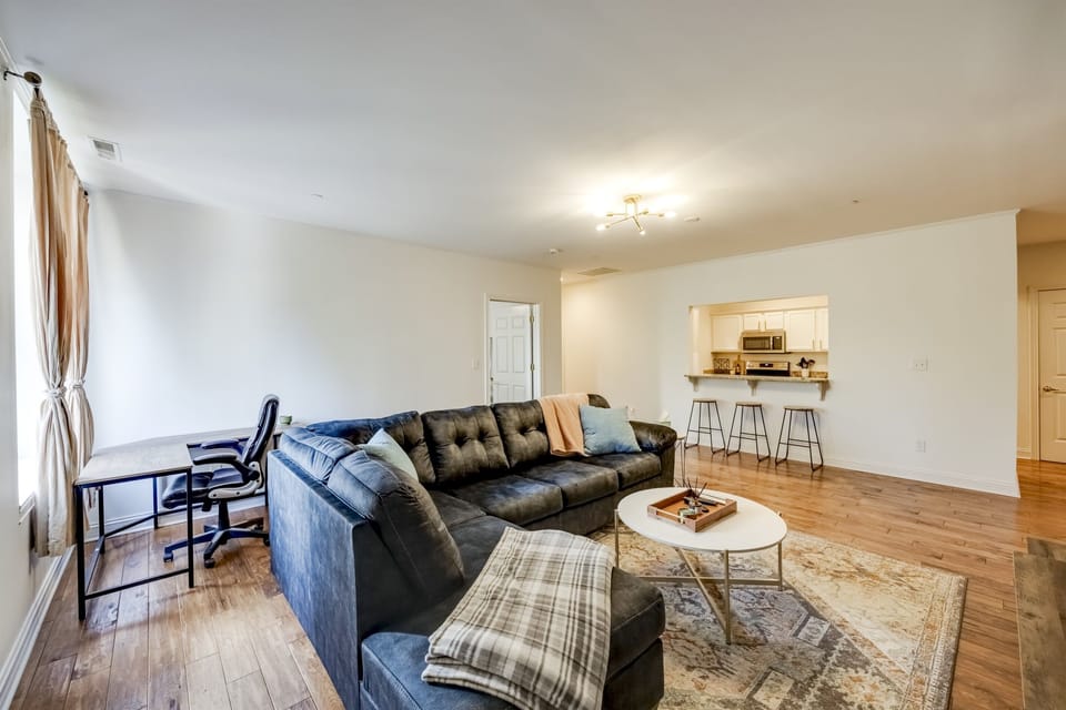 Full view of the living room showcasing the open-plan layout that extends into the dining area—ideal for entertaining.
