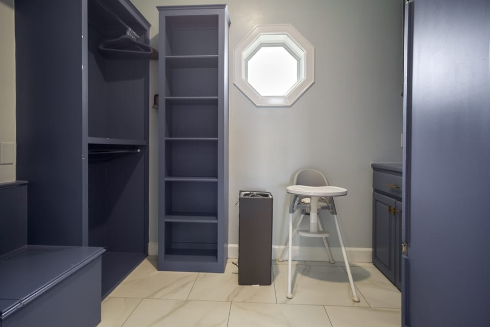 The Paradise Palms Primary Bedroom One: Generous storage, pack n play, highchair for our littler guests. 