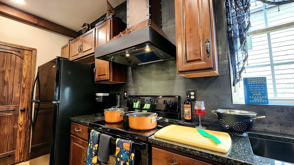The kitchen has the essential items you need for making meals to enjoy together.