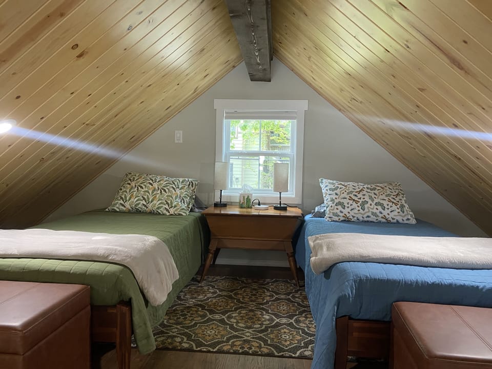 Loft with two twin beds for the young at heart and not so tall. 