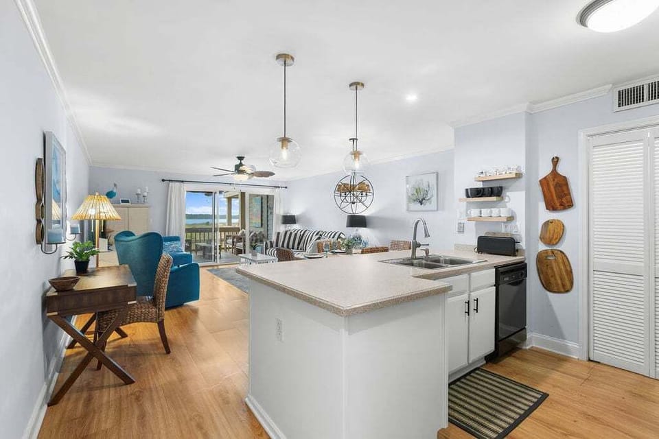Beautiful kitchen open ups to the living room.