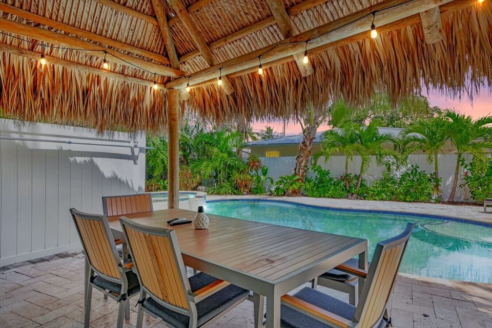 Poolside dining with a tropical twist at our stunning tiki hut