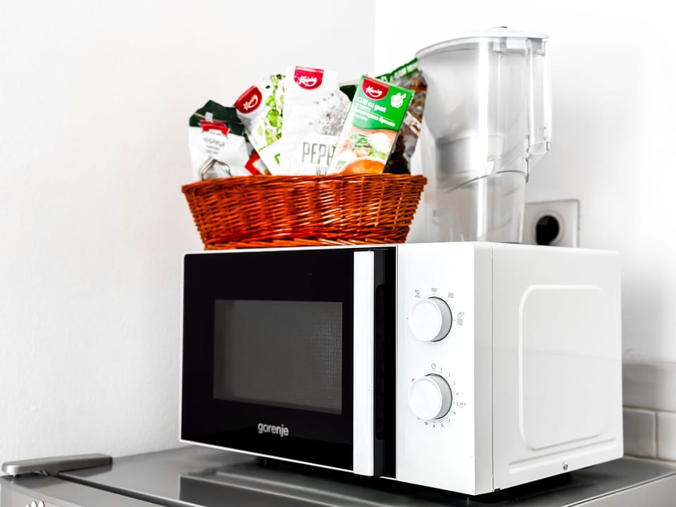 Cook up a storm with modern appliances and ample space. Need specifics on kitchenware? Message us!