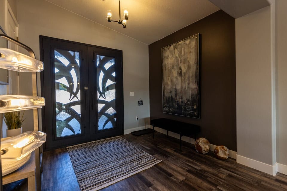 Entry with beautiful double doors.