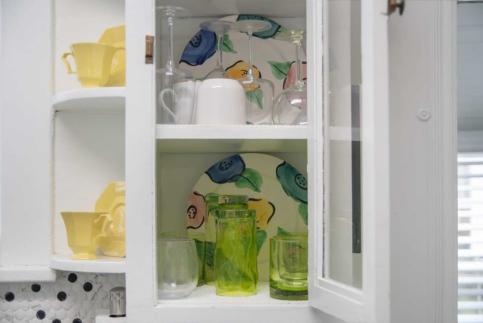 Fully stocked kitchen with all the essentials—coffee maker, cookware, blender, and more—perfect for cooking and dining together!