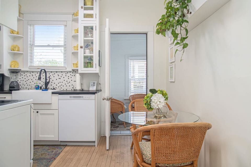 Fully stocked kitchen with all the essentials—coffee maker, cookware, blender, and more—perfect for cooking and dining together!