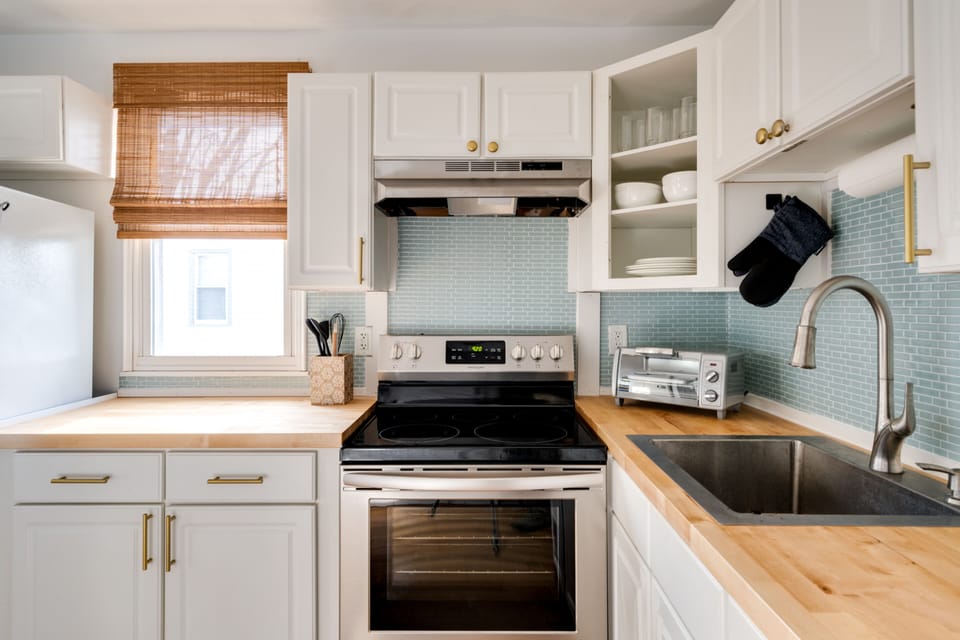 Electric Cooktop with Oven. 
We do not have a dishwasher.