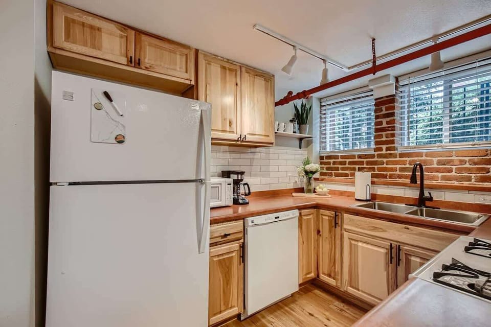 The kitchen comes equipped with all the essentials you need to prep meals from home