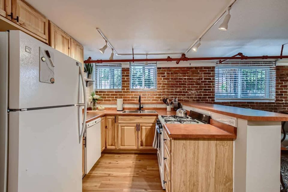 The exposed brick is a piece of history from the old build that we wanted to perserve