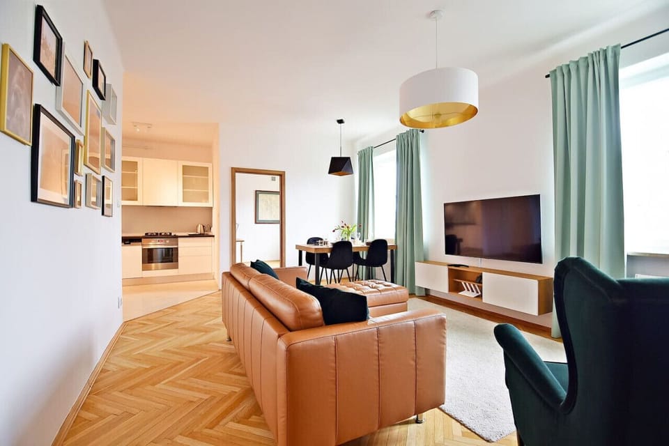Comfortable Living Room with Sofa Bed and Smart TV | Book Now with RENTUJEMY