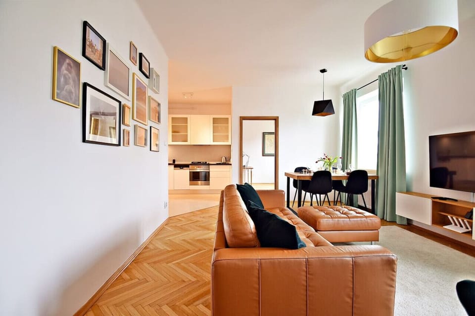 Comfortable Living Room with Sofa Bed and Smart TV | Book Now with RENTUJEMY