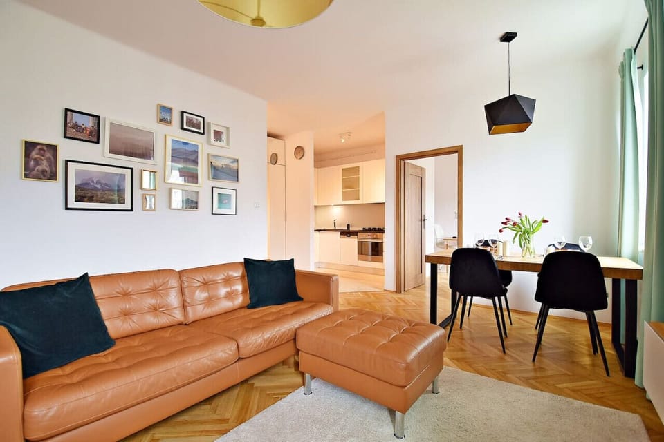 Comfortable Living Room with Sofa Bed and Smart TV | Book Now with RENTUJEMY