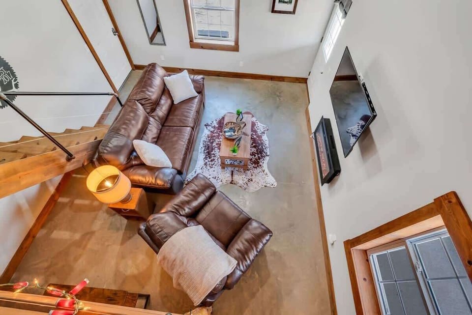 Elevated loft view of the spacious living area.