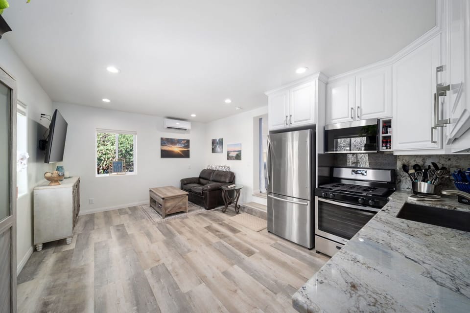 Enjoy the open kitchen w/gorgeous granite countertops