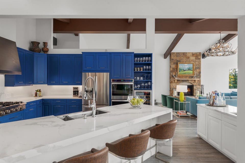 Island seating for easy entertaining & visiting, 100 bottle wine fridge & bar