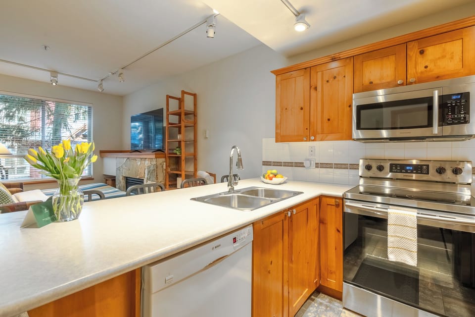 Spacious counter space and dishwasher for easy meal prep and clean-up.

