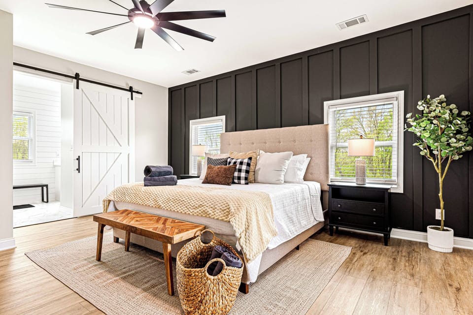 Primary Bedroom w/ Plush King mattress,  double vanity en-suite bathroom, TV