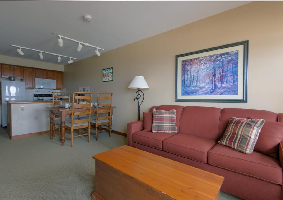 The sleeper sofa has sleeping capacity for two additional people.