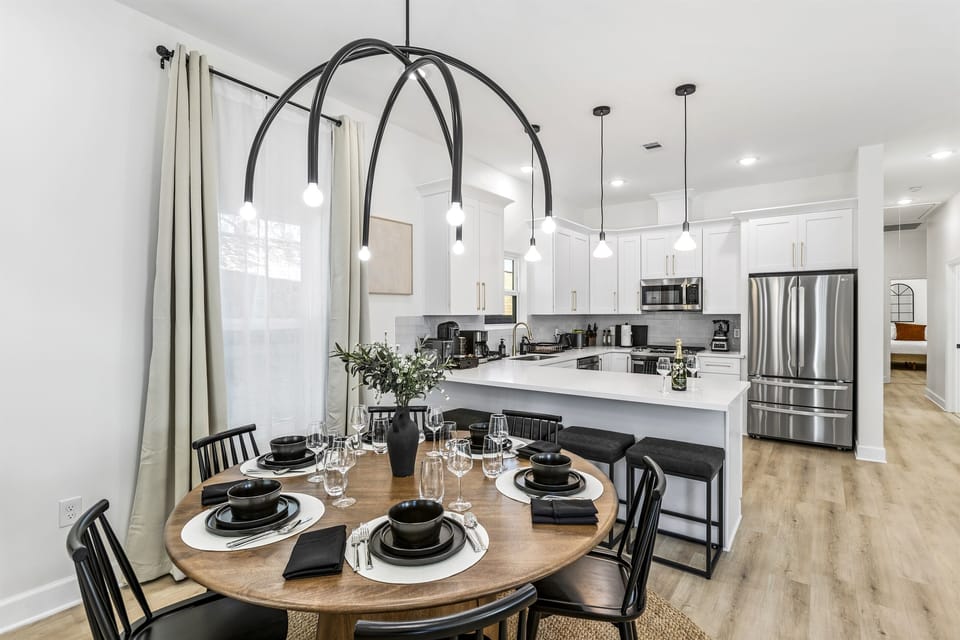 One table, every seat filled — dinners, card games, and the conversations your family will talk about for years.