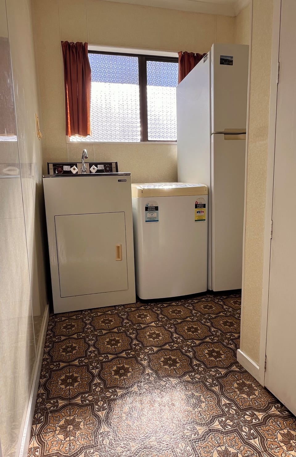 Washing machine (drying racks and washing baskets in all wardrobes).