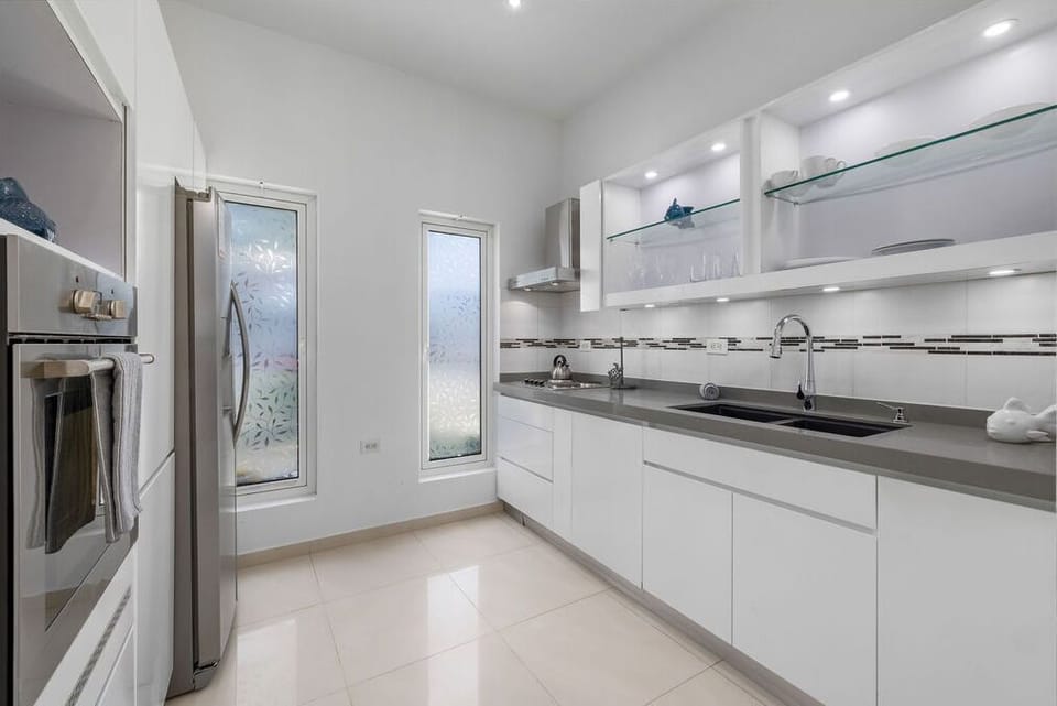 Discover the convenience of a second kitchen located in the apartment, providing added flexibility and comfort for your stay, whether you're entertaining guests or simply enjoying a quiet meal away from the main house.
