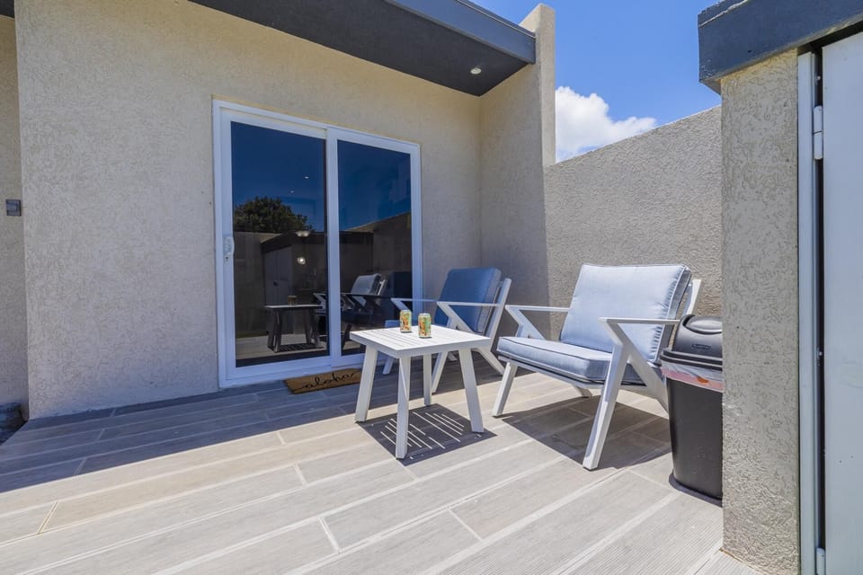 Embrace serenity on our poolside patio, where daylight brings tranquility and relaxation.