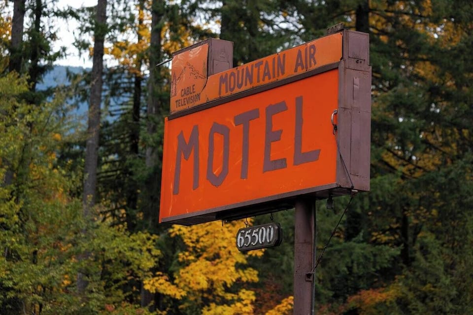 Step back in time! Our charming original 1950s Mountain Air Motel sign welcomes you to a unique stay. Book your nostalgic getaway!