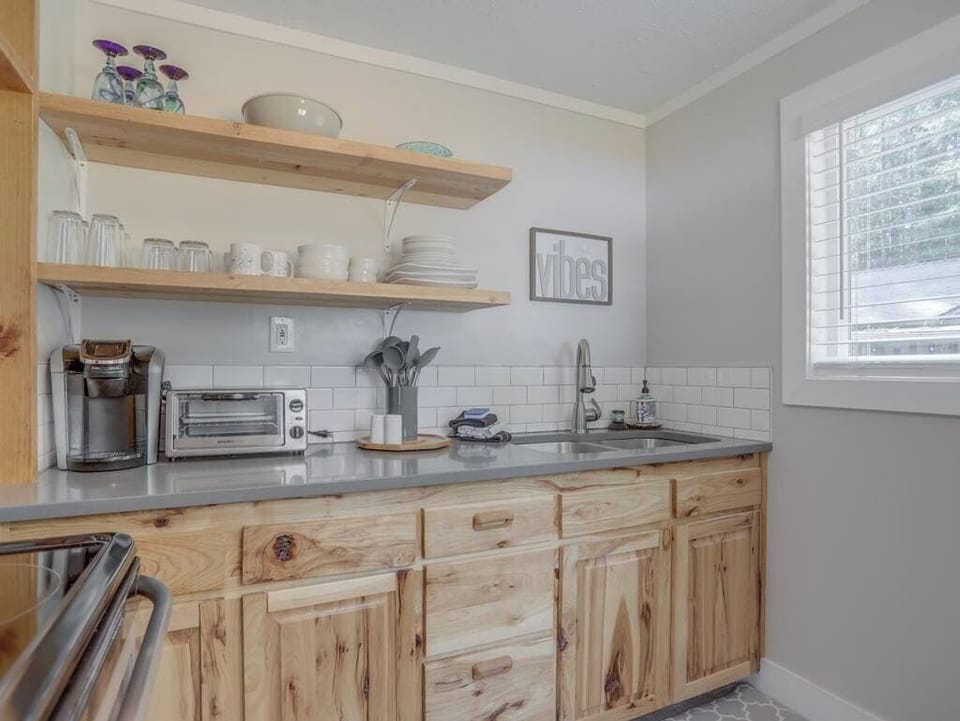 Whip up delicious meals in our fully stocked kitchen! Everything you need to cook and enjoy during your stay. 
