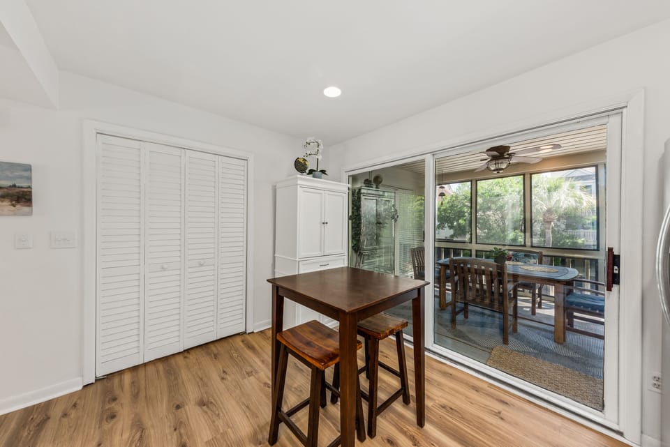 Screened porch off of the kitchen