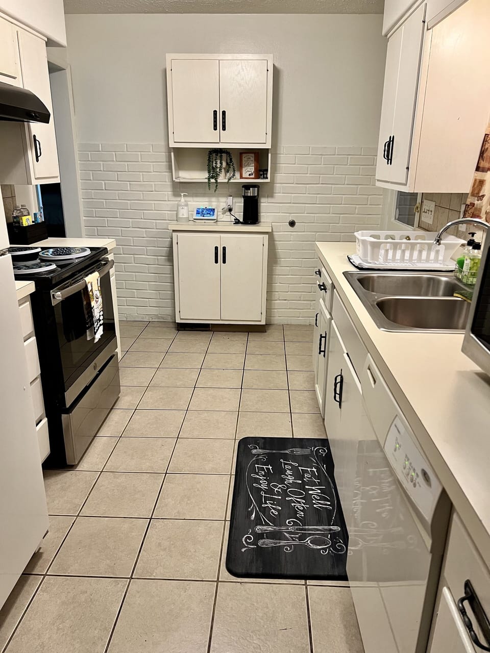 Walk through kitchen with appliances