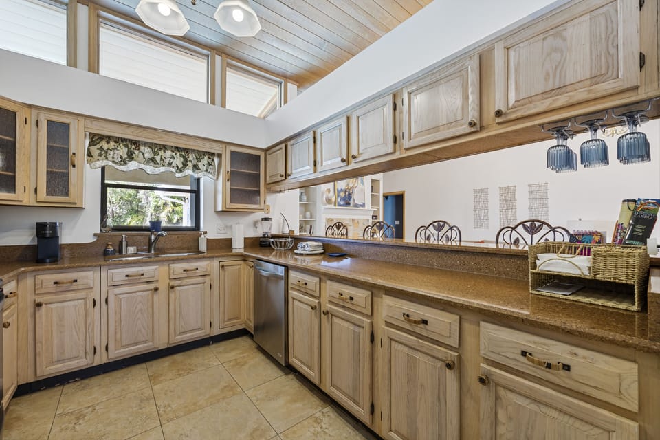 The kitchen opens to the living room.