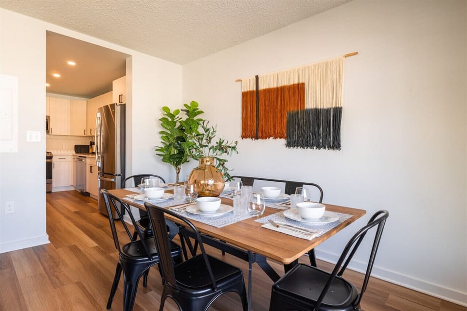 You’ll feel right at home in this inviting dining room, where you can enjoy meals with family or friends in a warm and comfortable setting.