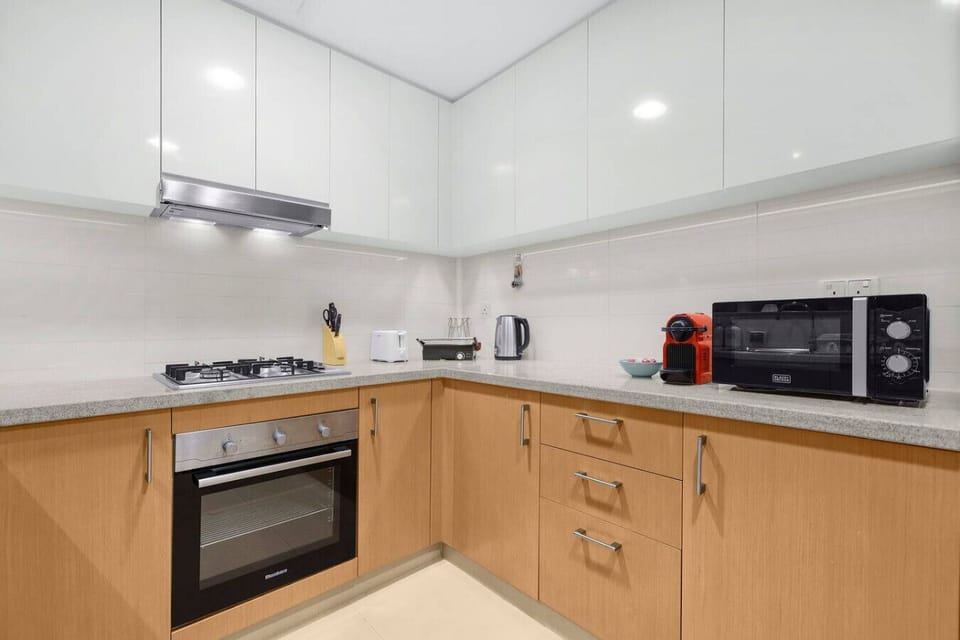 Kitchen: Whip up culinary delights in this modern, well-equipped kitchen with stylish finishes!