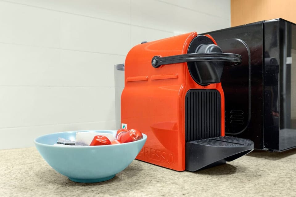 Coffee Corner: Start your day with rich espresso from our chic coffee machine!