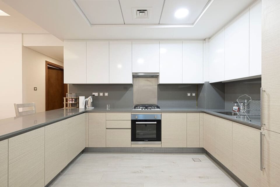 Modern Kitchen: Whip up culinary delights in this sleek, stylish space with top-notch appliances!