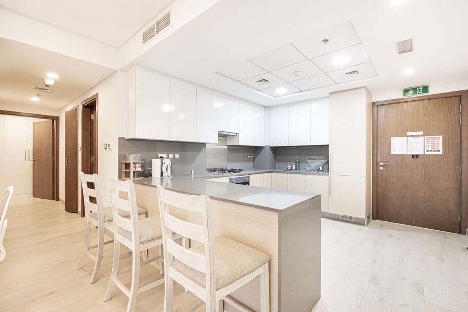 Kitchen: Sleek and modern space to unleash your culinary creativity! Enjoy shared meals and laughter!