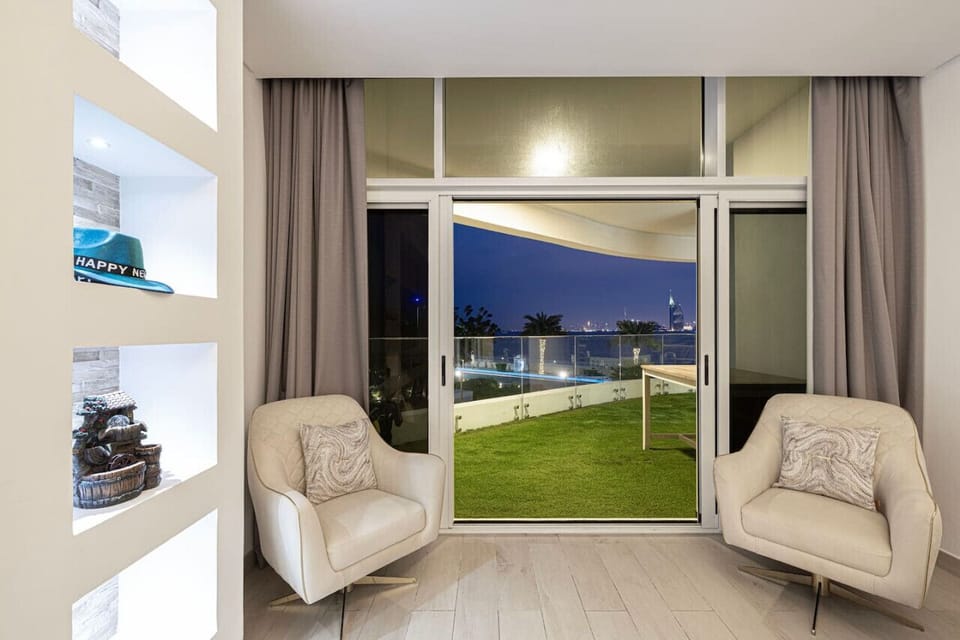 Balcony Lounge: Enjoy breathtaking skyline views and delightful evenings in this chic retreat!