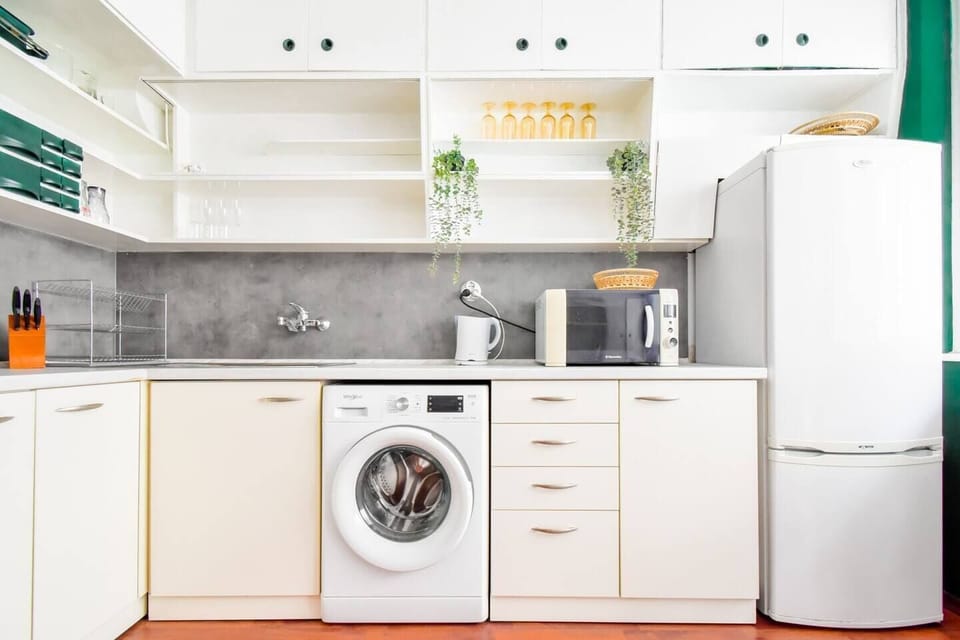 “Cook like a local in this retro-modern kitchen—equipped for every craving.”
➡️ Stay in and dine in style.
