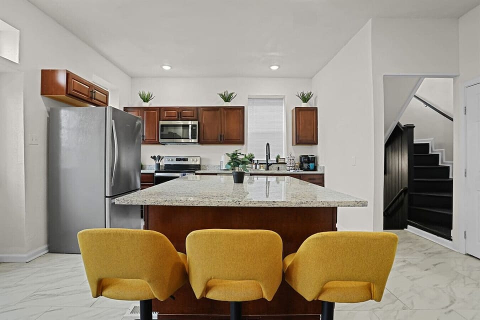 Embrace culinary creativity in a sleek space with sunny seating and modern amenities!