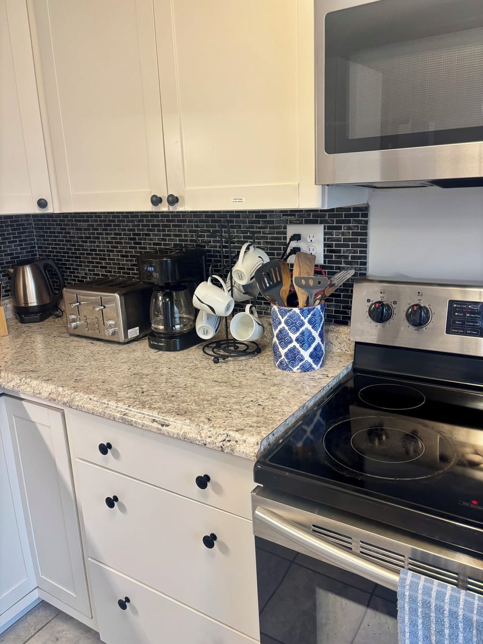 coffee, creamer, seasoning basics in cabinet